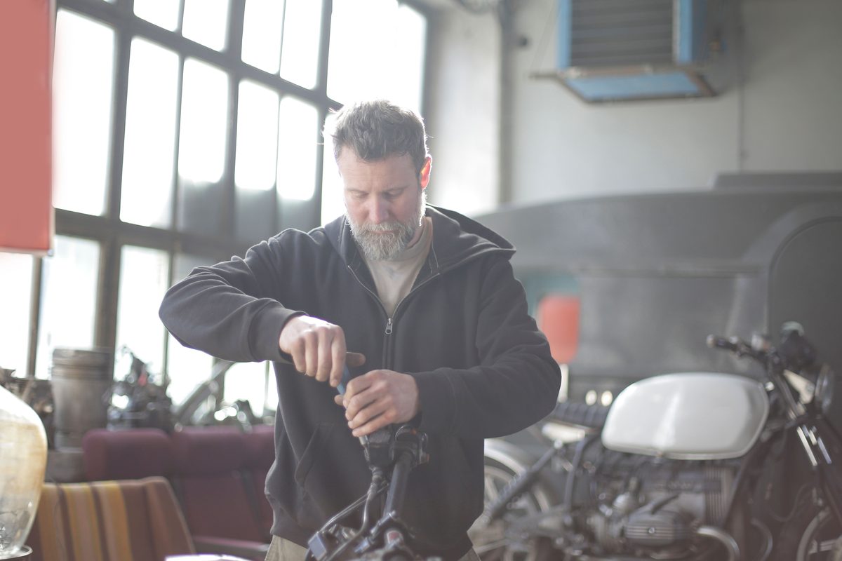 Mechanic using WHY Parts in workshop